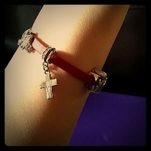 Cute red bracelet with 3 charms.
